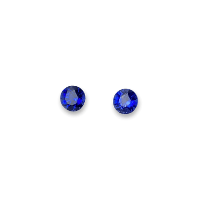 Elegant blue sapphire pair showcasing vibrant, deep blue hues with brilliant faceting, perfect for fine jewellery or gemstone collections.